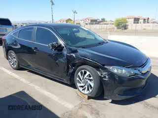 2018 Honda Civic EX with VIN 19XFC2F74JE021802, listed as a IAAI auction lot 42031745 with 102,986 mi miles and . Bid and sale history available at DreamBid. Image 6.