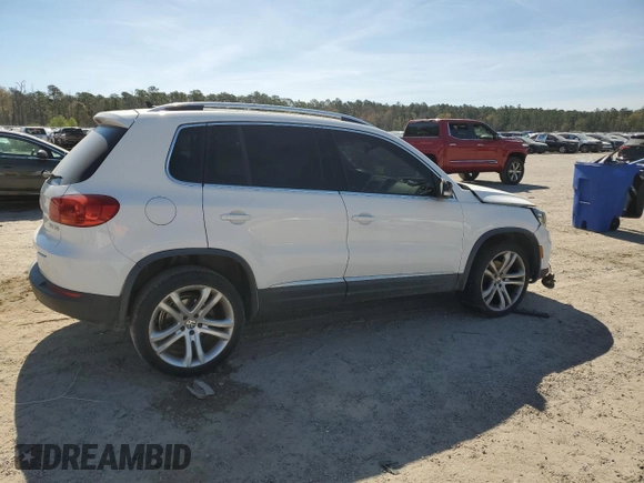 2012 Volkswagen Tiguan SEL with VIN WVGAV7AX9CW530331, listed as a Copart auction lot 50129405 with 141,387 mi miles and Salvage Title. Bid and sale history available at DreamBid. Image 3.
