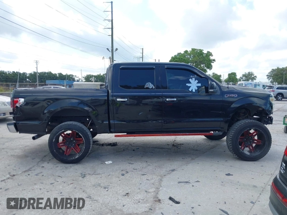 2015 Ford F-150 XLT with VIN 1FTEW1C81FFB05261, listed as a IAAI auction lot 42193554 with Not Provided miles and . Bid and sale history available at carsss.com. Image 13.