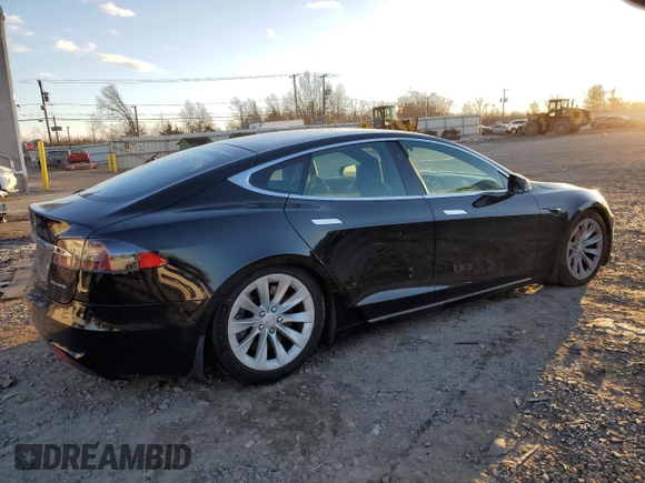 2019 Tesla Model S 75D with VIN 5YJSA1E23KF330239, listed as a Copart auction lot 86737544 with Not provided miles and Salvage title. Bid and sale history available at DreamBid. Image 3.