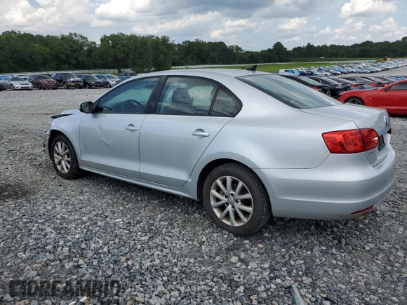 2012 Volkswagen Jetta SE with VIN 3VWDX7AJ1CM389131, listed as a Copart auction lot 64947474 with 140,331 mi miles and Salvage title. Bid and sale history available at DreamBid. Image 2.