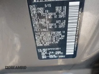 2015 Nissan Quest SV with VIN JN8AE2KP2F9130611, listed as a IAAI auction lot 41798017 with 79,228 mi miles. Bid and sale history available at carsss.com. Image 9.