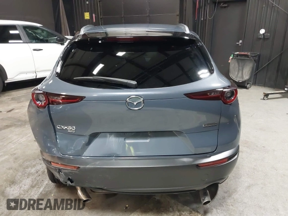 2022 Mazda CX-30 S Carbon Edition with VIN 3MVDMBCL8NM447234, listed as a IAAI auction lot 42511600 with 51,926 mi miles and . Bid and sale history available at DreamBid. Image 16.
