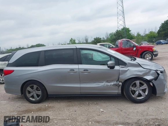 2019 Honda Odyssey EX with VIN 5FNRL6H53KB129212, listed as a IAAI auction lot 42474440 with 142,431 mi miles and . Bid and sale history available at DreamBid. Image 13.