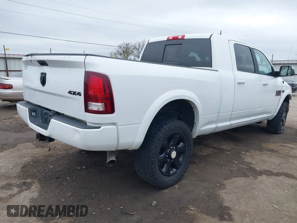2018 Ram 2500 Laramie with VIN 3C6UR5NJ4JG328211, listed as a IAAI auction lot 41690078 with 97,265 mi miles and . Bid and sale history available at DreamBid. Image 4.