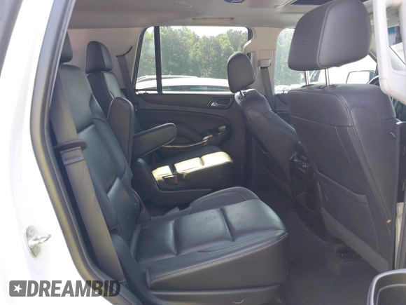 2019 Chevrolet Tahoe LT with VIN 1GNSCBKC2KR128944, listed as a IAAI auction lot 42600686 with 92,980 mi miles and . Bid and sale history available at DreamBid. Image 8.