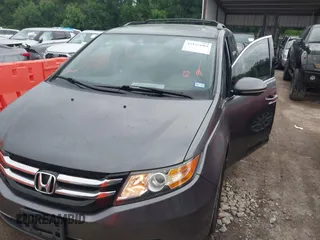 2016 Honda Odyssey Touring Elite with VIN 5FNRL5H96GB063176, listed as a IAAI auction lot 42157604 with 106,177 mi miles. Bid and sale history available at carsss.com. Image 6.