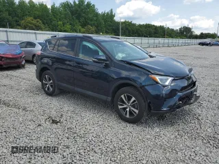 2018 Toyota RAV4 XLE with VIN 2T3WFREVXJW483012, listed as a Copart auction lot 58806205 with 48,266 mi miles and Salvage title. Bid and sale history available at DreamBid. Image 4.