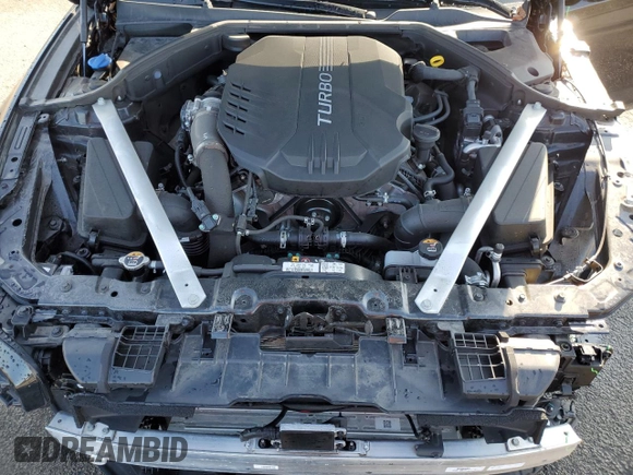 2023 Genesis G70 3.3T with VIN KMTG54TE4PU122153, listed as a Copart auction lot 50794015 with 13,604 mi miles and Salvage title. Bid and sale history available at DreamBid. Image 12.