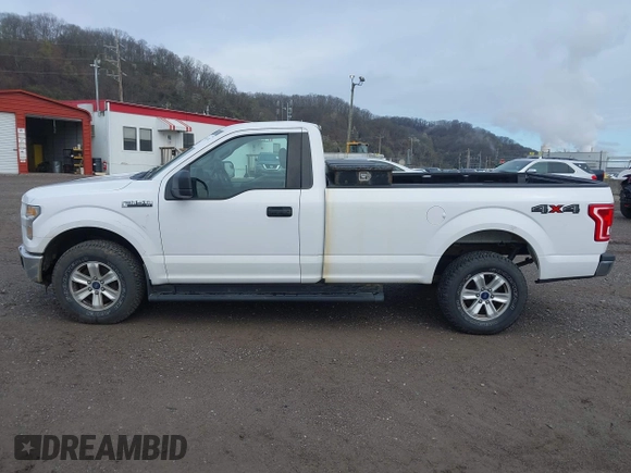 2016 Ford F-150 XL with VIN 1FTMF1EF4GKE09829, listed as a IAAI auction lot 41947402 with 124,150 mi miles and . Bid and sale history available at DreamBid. Image 15.