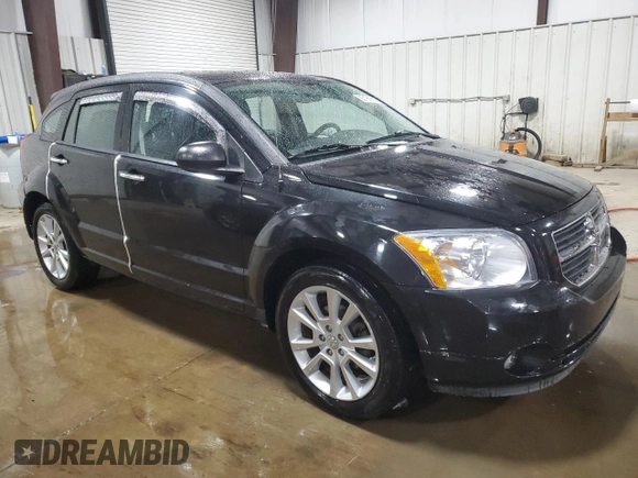 2011 Dodge Caliber Heat with VIN 1B3CB5HA9BD116800, listed as a Copart auction lot 50162915 with 59,629 mi miles and Salvage Title. Bid and sale history available at DreamBid. Image 4.