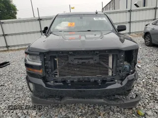 2016 Chevrolet Silverado 1500 LT with VIN 3GCUKREC1GG388719, listed as a Copart auction lot 49661455 with 138,886 mi miles and Salvage Title. Bid and sale history available at DreamBid. Image 5.