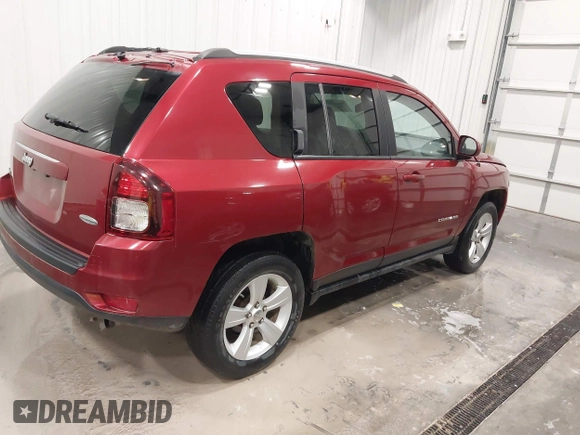 2016 Jeep Compass Latitude with VIN 1C4NJDEB4GD706945, listed as a IAAI auction lot 42010529 with 74,742 mi miles and . Bid and sale history available at DreamBid. Image 4.
