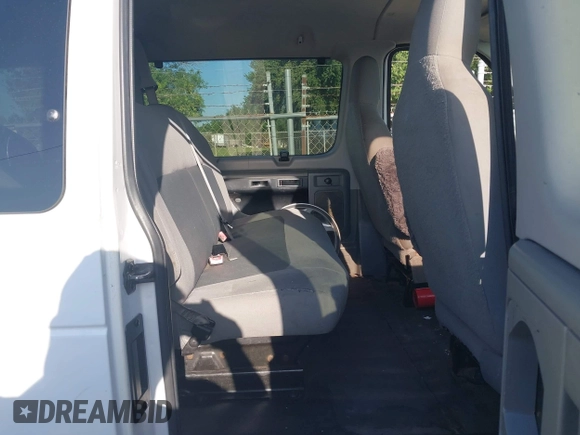 2014 Ford Econoline Wagon XL with VIN 1FBSS3BLXEDA86613, listed as a IAAI auction lot 41996263 with 238,848 mi miles. Bid and sale history available at carsss.com. Image 8.