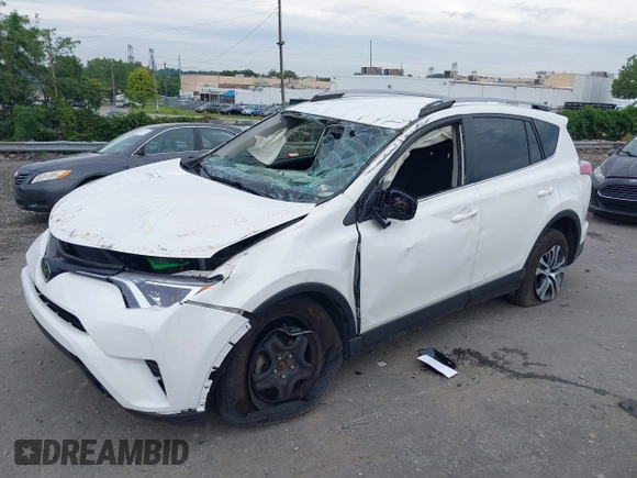 2018 Toyota RAV4 LE with VIN JTMBFREV6JJ210226, listed as a IAAI auction lot 42700312 with Not provided miles and . Bid and sale history available at DreamBid. Image 18.