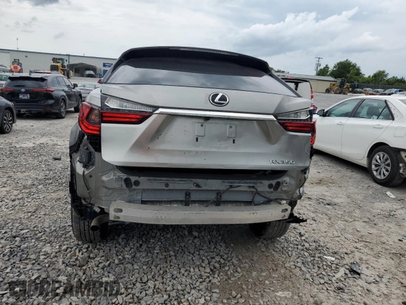2020 Lexus RX 350 с VIN 2T2HZMDA1LC242563, выставлен на аукционе Copart как лот 57277565 с пробегом 62 633 миль миль и Списание • Salvage title. История ставок и продаж доступна на DreamBid. Изображение 6.