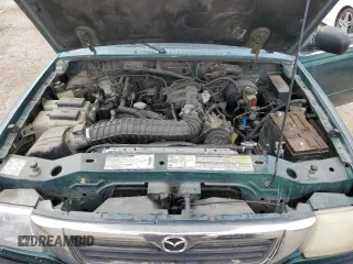 1999 Mazda B-Series 2WD Truck SE with VIN 4F4YR16X9XTM14266, listed as a Copart auction lot 44639735 with 199,397 mi miles and Salvage Title. Bid and sale history available at carsss.com. Image 11.