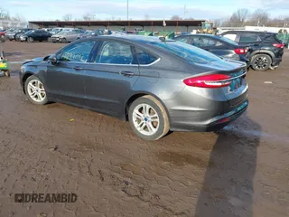 2018 Ford Fusion SE z VIN 3FA6P0HD7JR259606, wystawiony jako IAAI lot #41649797 z przebiegiem 94 094 mil mil oraz . Historia ofert i sprzedaży dostępna na DreamBid. Obrazek 3.