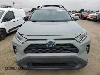 2021 Toyota RAV4 Hybrid XLE with VIN 2T3RWRFV8MW116853, listed as a Copart auction lot 65974935 with 89,319 mi miles and Salvage title. Bid and sale history available at DreamBid. Image 5.