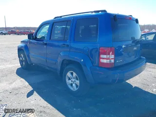 2009 Jeep Liberty Sport with VIN 1J8GN28K69W533457, listed as a IAAI auction lot 41831960 with 185,403 mi miles. Bid and sale history available at carsss.com. Image 3.