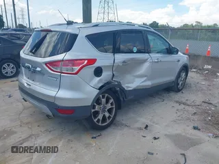 2014 Ford Escape Titanium с VIN 1FMCU0J91EUD93260, выставлен на аукционе IAAI как лот 42495051 с пробегом 97 164 миль миль и . История ставок и продаж доступна на DreamBid. Изображение 4.
