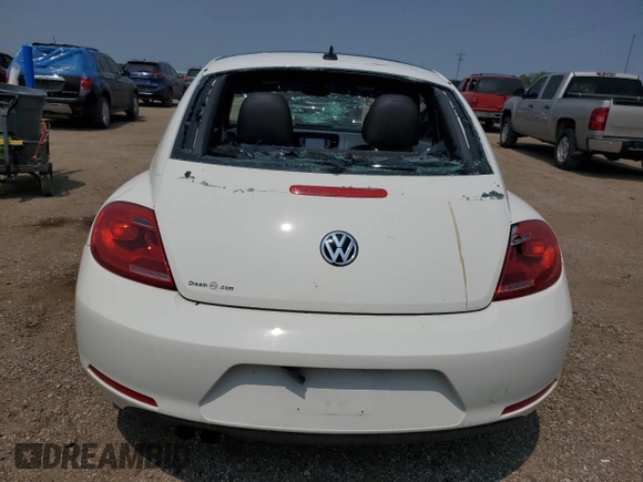 2013 Volkswagen Beetle with VIN 3VWHX7AT2DM656457, listed as a Copart auction lot 63814944 with 92,966 mi miles and Salvage Title. Bid and sale history available at DreamBid. Image 6.