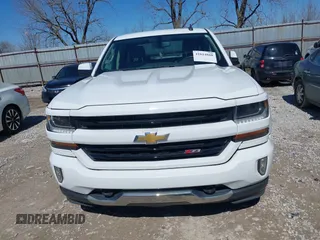 2017 Chevrolet Silverado 1500 LT with VIN 3GCUKREC3HG489701, listed as a IAAI auction lot 41814860 with 218,605 mi miles. Bid and sale history available at carsss.com. Image 12.