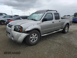 2003 Nissan Frontier SVE with VIN 1N6MD29Y13C457765, listed as a Copart auction lot 54698125 with 182,146 mi miles and Salvage title. Bid and sale history available at DreamBid. Image 1.