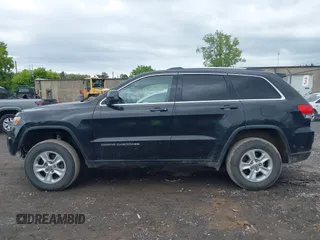 2016 Jeep Grand Cherokee Laredo with VIN 1C4RJFAG2GC436005, listed as a IAAI auction lot 42377859 with 129,724 mi miles and . Bid and sale history available at DreamBid. Image 15.