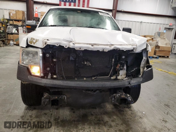 2014 Ford F-150 XL with VIN 1FTMF1CM7EKD61547, listed as a Copart auction lot 51966015 with 175,234 mi miles and Salvage title. Bid and sale history available at DreamBid. Image 5.