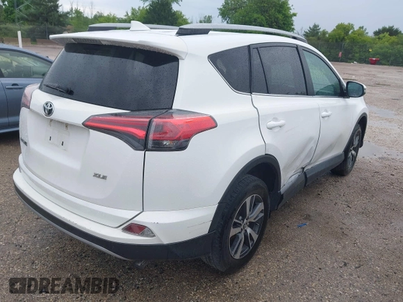 2018 Toyota RAV4 XLE with VIN 2T3WFREV4JW469929, listed as a IAAI auction lot 42536958 with 82,443 mi miles and . Bid and sale history available at DreamBid. Image 4.