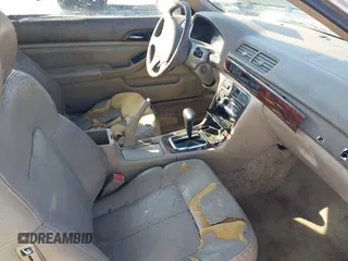 1999 Acura CL Premium z VIN 19UYA2255XL014474, wystawiony jako IAAI lot #42124075 z przebiegiem 212 404 mil mil oraz . Historia ofert i sprzedaży dostępna na DreamBid. Obrazek 5.