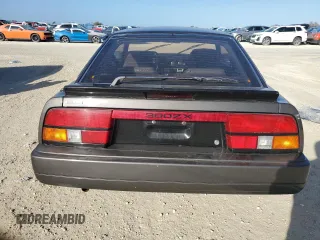 1986 Nissan 300ZX z VIN JN1HZ16S9GX094097, wystawiony jako Copart lot #75251134 z przebiegiem Nie podano mil oraz Szkoda całkowita • Salvage title. Historia ofert i sprzedaży dostępna na DreamBid. Obrazek 6.