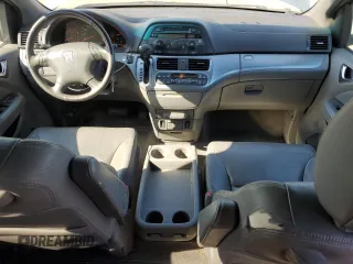 2010 Honda Odyssey EX-L with VIN 5FNRL3H62AB031763, listed as a Copart auction lot 52800055 with 220,450 mi miles and Salvage Title. Bid and sale history available at DreamBid. Image 8.