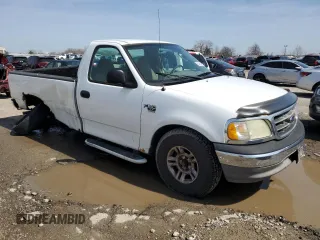 2003 Ford F-150 XL with VIN 1FTRF17W53NB56130, listed as a Copart auction lot 51428325 with 197,539 mi miles and Salvage title. Bid and sale history available at DreamBid. Image 4.
