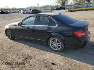 2014 Mercedes-Benz C 250 Sport with VIN WDDGF4HB5ER311927, listed as a Copart auction lot 52055205 with 89,952 mi miles and Salvage title. Bid and sale history available at DreamBid. Image 2.
