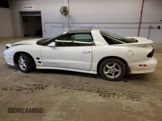 2000 Pontiac Firebird Formula z VIN 2G2FV22GXY2112840, wystawiony jako Copart lot #76244634 z przebiegiem 105 197 mil mil oraz Czysty tytuł • Clean title. Historia ofert i sprzedaży dostępna na DreamBid. Obrazek 2.