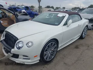 2015 Bentley Continental GT with VIN SCBGJ3ZAXFC044364, listed as a IAAI auction lot 39947673 with 3,514 mi miles and . Bid and sale history available at DreamBid. Image 18.