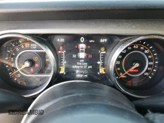 2021 Jeep Gladiator Willys z VIN 1C6HJTAG8ML563161, wystawiony jako Copart lot #52734195 z przebiegiem 48 521 mil mil oraz Szkoda całkowita • Salvage title. Historia ofert i sprzedaży dostępna na DreamBid. Obrazek 9.