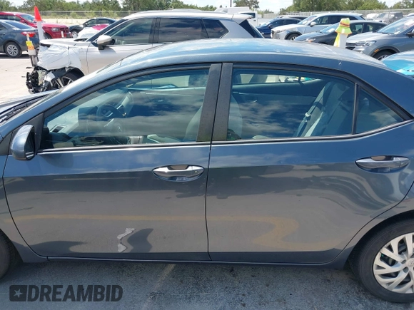 2018 Toyota Corolla L with VIN 5YFBURHE1JP832911, listed as a IAAI auction lot 42237901 with 92,158 mi miles and . Bid and sale history available at DreamBid. Image 14.