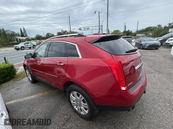2015 Cadillac SRX Luxury Collection z VIN 3GYFNBE37FS569840, wystawiony jako Copart lot #56965835 z przebiegiem 183 817 mil mil oraz Tytuł czysty. Historia ofert i sprzedaży dostępna na DreamBid. Obrazek 3.