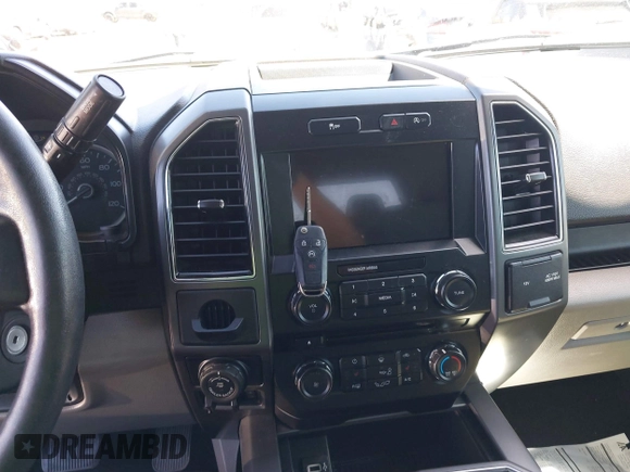 2018 Ford F-150 XL with VIN 1FTEW1CGXJKE00575, listed as a IAAI auction lot 41827249 with 138,019 mi miles. Bid and sale history available at carsss.com. Image 11.