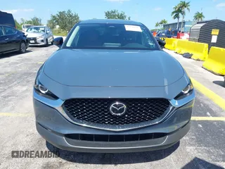 2024 Mazda CX-30 S Carbon Edition z VIN 3MVDMBCM0RM661018, wystawiony jako IAAI lot #42326256 z przebiegiem 22 169 mil mil oraz . Historia ofert i sprzedaży dostępna na DreamBid. Obrazek 12.