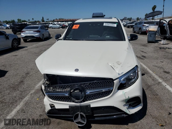 2019 Mercedes-Benz GLC with VIN WDC0J6EB9KF617563, listed as a Copart auction lot 52665394 with 69,419 mi miles and Salvage Title. Bid and sale history available at carsss.com. Image 5.
