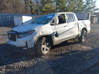 2021 Honda Ridgeline Sport with VIN 5FPYK3F1XMB011441, listed as a IAAI auction lot 41315524 with 59,840 mi miles and . Bid and sale history available at DreamBid. Image 2.