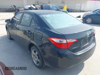 2015 Toyota Corolla L with VIN 5YFBURHE7FP255910, listed as a IAAI auction lot 42132289 with 97,635 mi miles and . Bid and sale history available at DreamBid. Image 3.