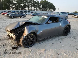 2016 Nissan 370Z z VIN JN1AZ4EH3GM932117, wystawiony jako Copart lot #70930924 z przebiegiem 42 955 mil mil oraz Szkoda całkowita • Salvage title. Historia ofert i sprzedaży dostępna na DreamBid. Obrazek 1.