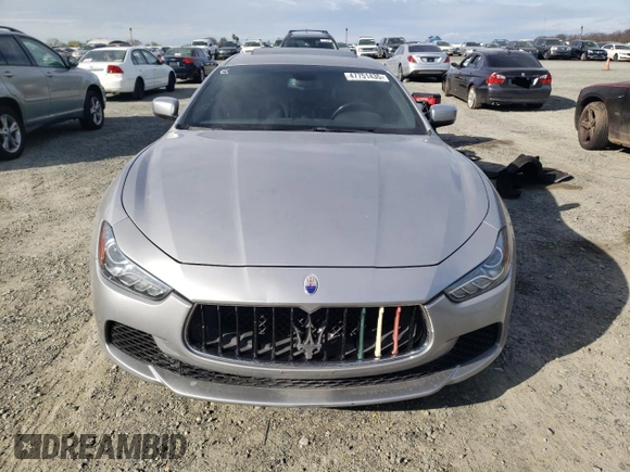 2014 Maserati Ghibli z VIN ZAM57XSA3E1105712, wystawiony jako Copart lot #47751435 z przebiegiem 88 432 mil mil oraz Szkoda całkowita • Salvage title. Historia ofert i sprzedaży dostępna na DreamBid. Obrazek 5.