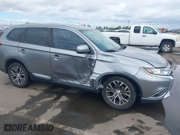 2018 Mitsubishi Outlander SE with VIN JA4AD3A31JZ016055, listed as a IAAI auction lot 42245714 with 97,448 mi miles and . Bid and sale history available at DreamBid. Image 6.