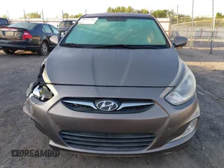 2012 Hyundai Accent GLS with VIN KMHCU4AE4CU097425, listed as a IAAI auction lot 42052740 with 244,705 mi miles. Bid and sale history available at carsss.com. Image 6.